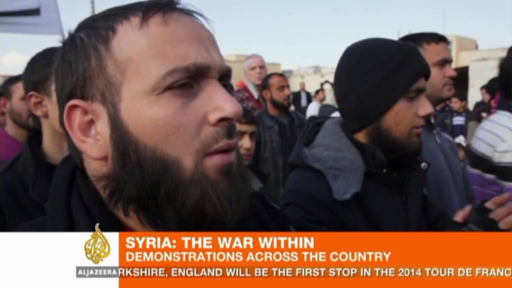 Syrian protesters say 'Assad is the terrorist'