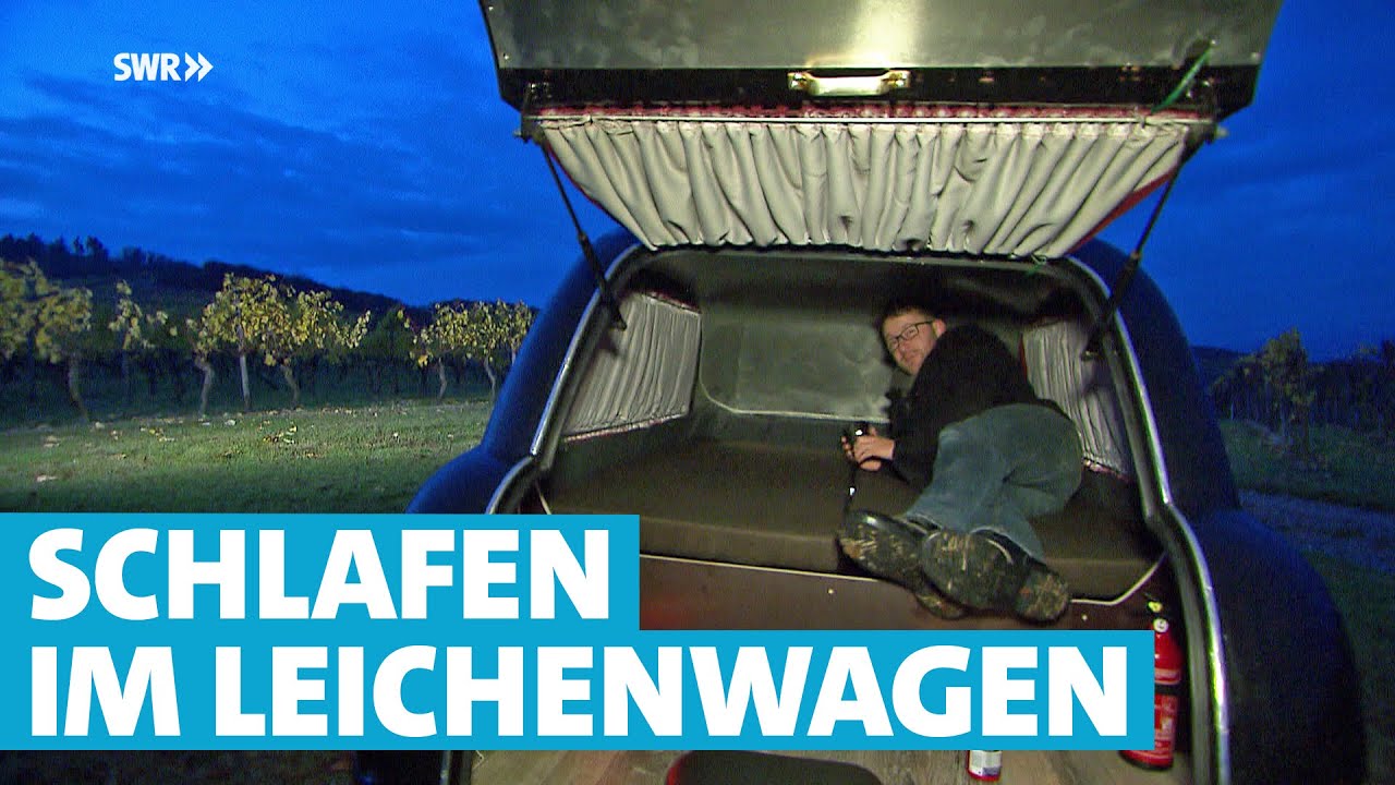 Leichenwagen zum Campinganhänger umgebaut