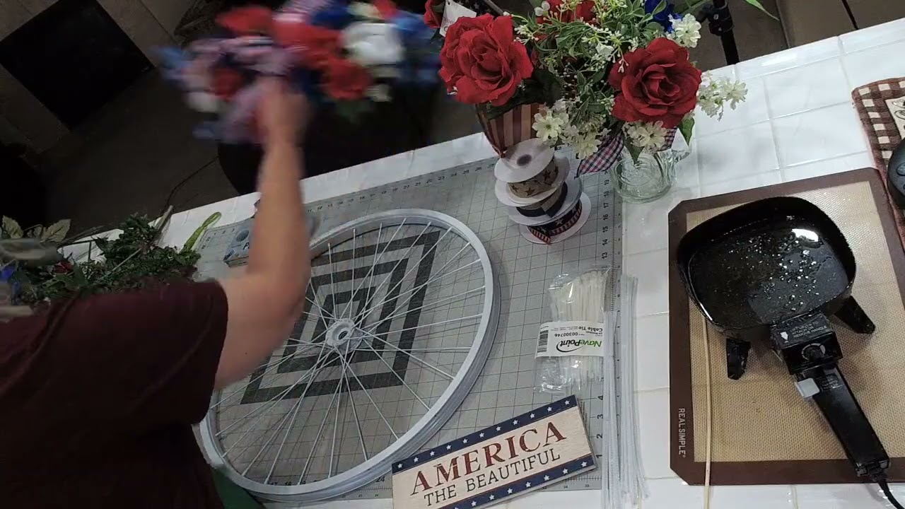 How to Make a Patriotic Floral Bike Wheel Wreath for Your Front Door in this DIY Tutorial