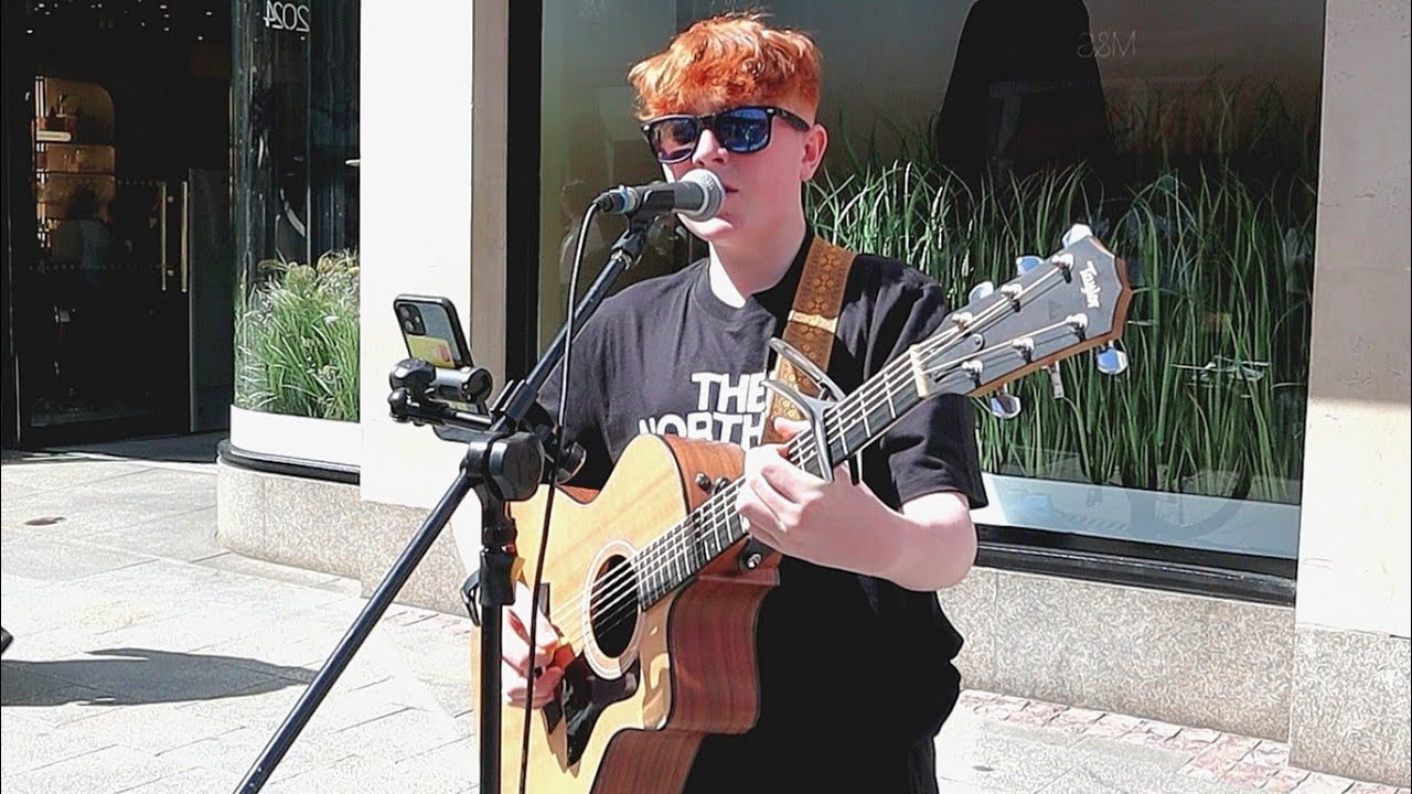 Ed Sheeran (Photograph) on Grafton Street with Fionn Whelan.