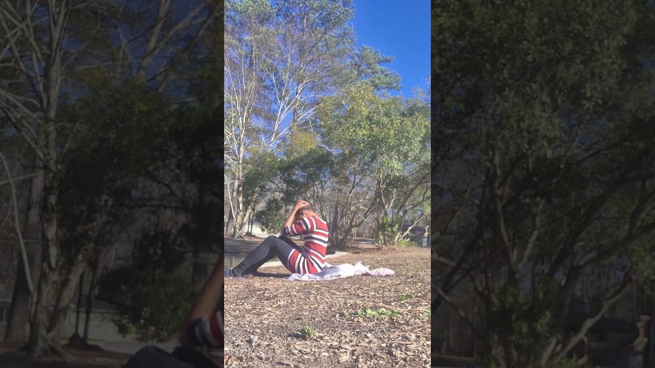 Doing 130 one hundred and thirty situps near the ducks near by the pond. 