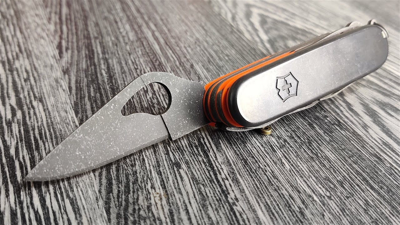 Spydernox Deluxe Tinker with flamed-black titanium scales