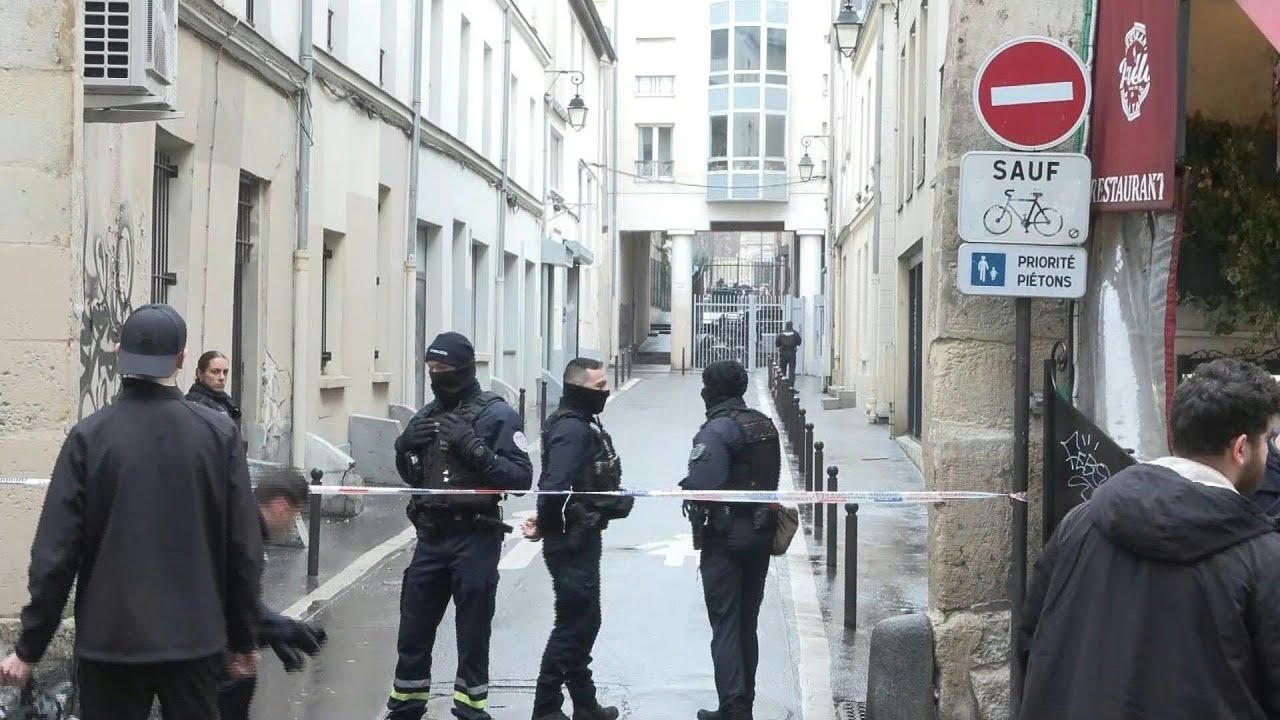 Police outside French hard-left party headquarters after bomb threat in Paris | AFP
