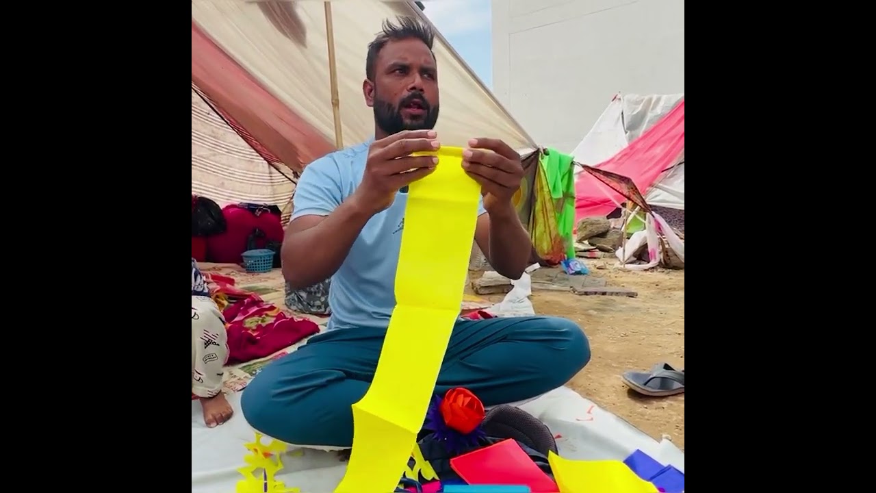 Poor man shows old art with the help of paper 