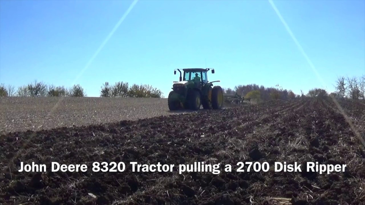 John Deere 8320 Tractor pulling a 2700 Disk Ripper near Arcanum Ohio