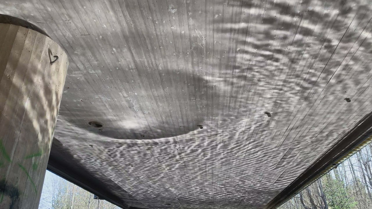 Wave reflections under a bridge