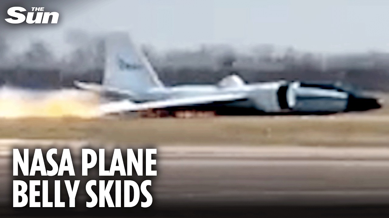 Terrifying moment NASA plane ERUPTS into flames as it touches down without landing gear