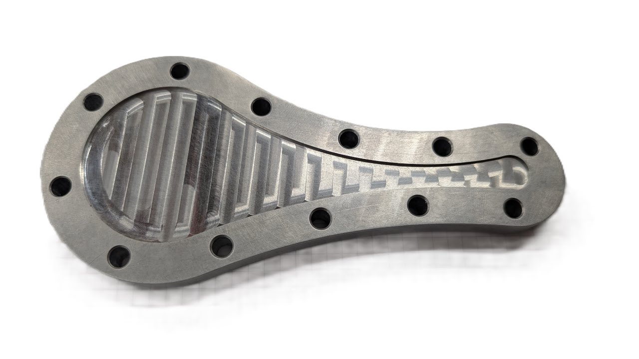 Precision fixture plate solves difficult part location problem.