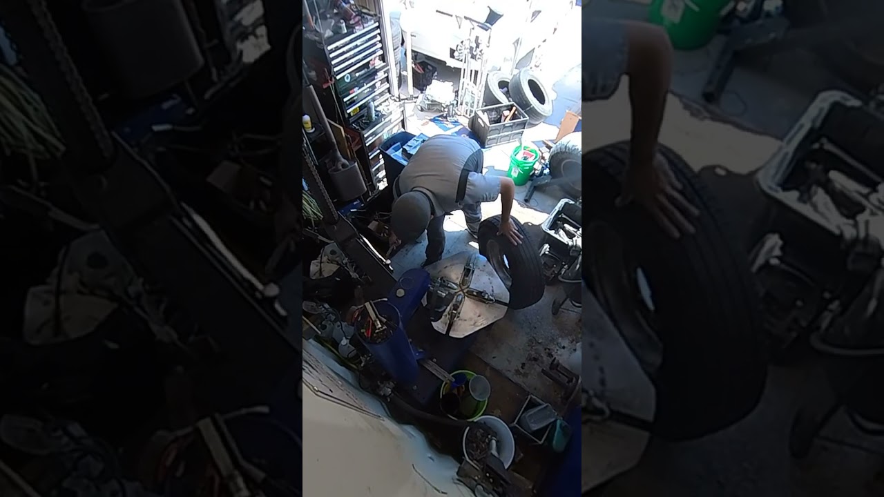 Dismounting a trailer tire.