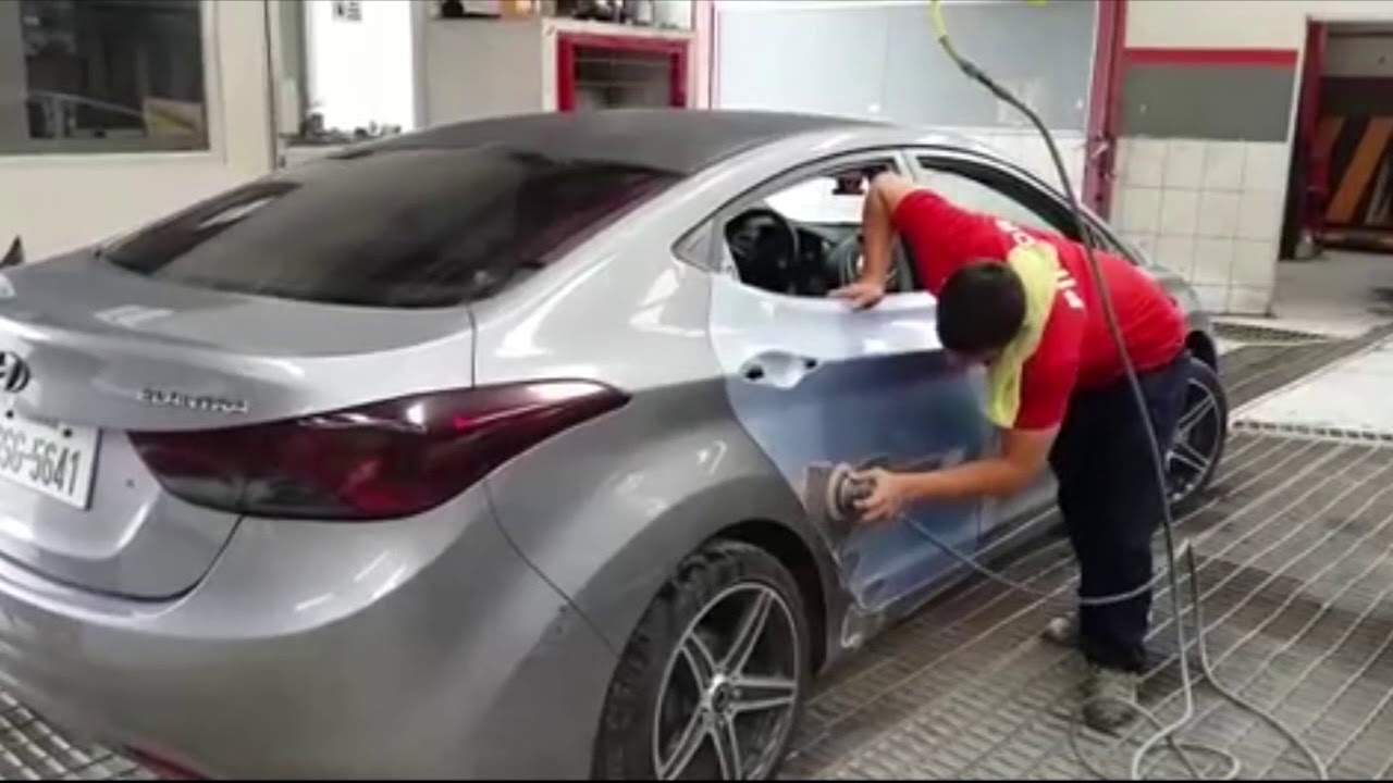 REPARACION VEHICULO HYUNDAI ELANTRA GRIS