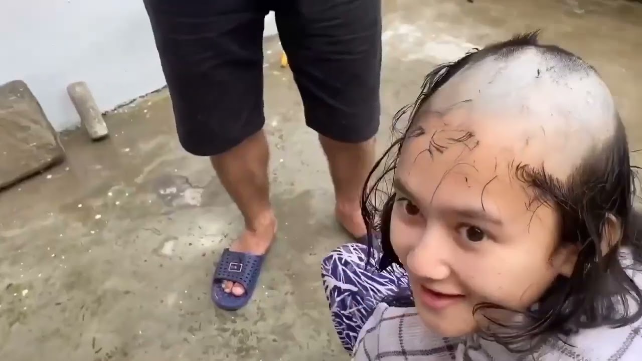Cute girl got clean headshave at home in lockdown by her father