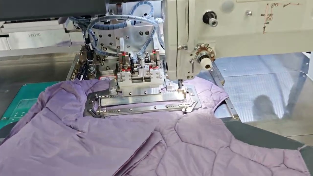 can welt pocket on down jacket by automatic machine?