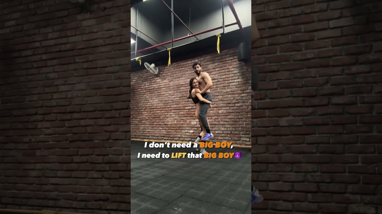 Indian girl lift and carry boy easily 