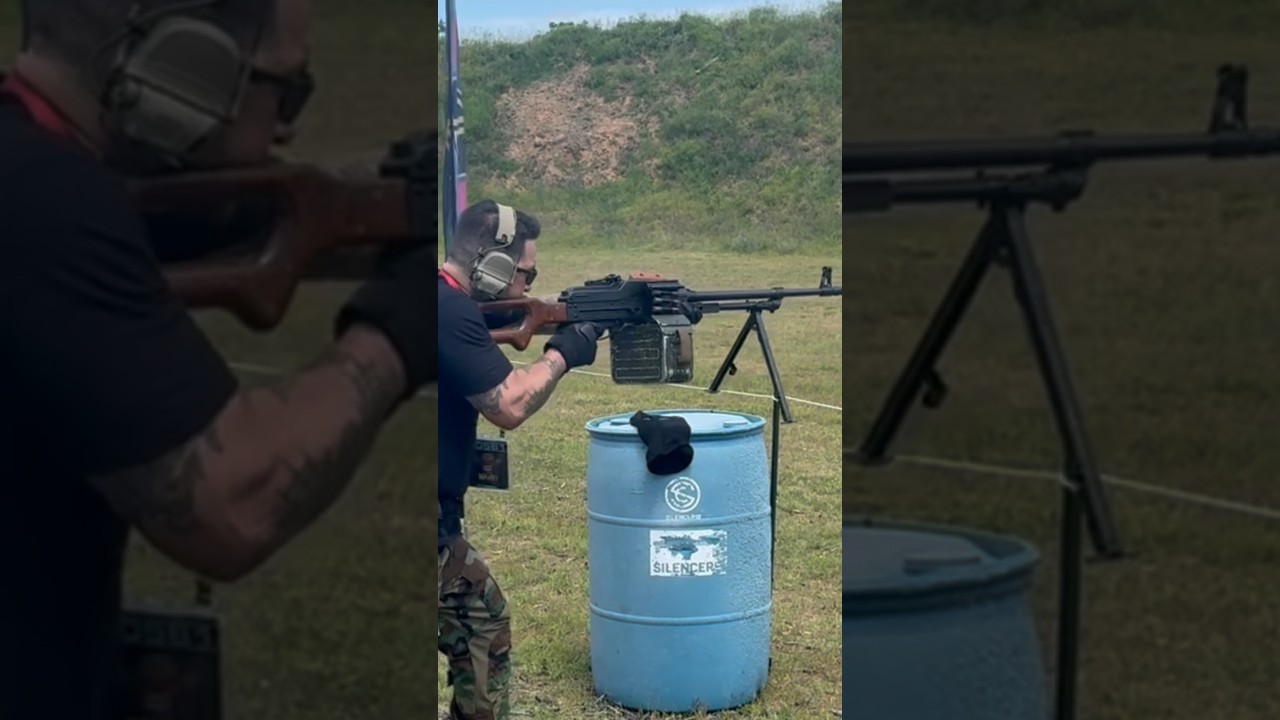 Russian PKM shoulder firing belt fed machine gun ￼