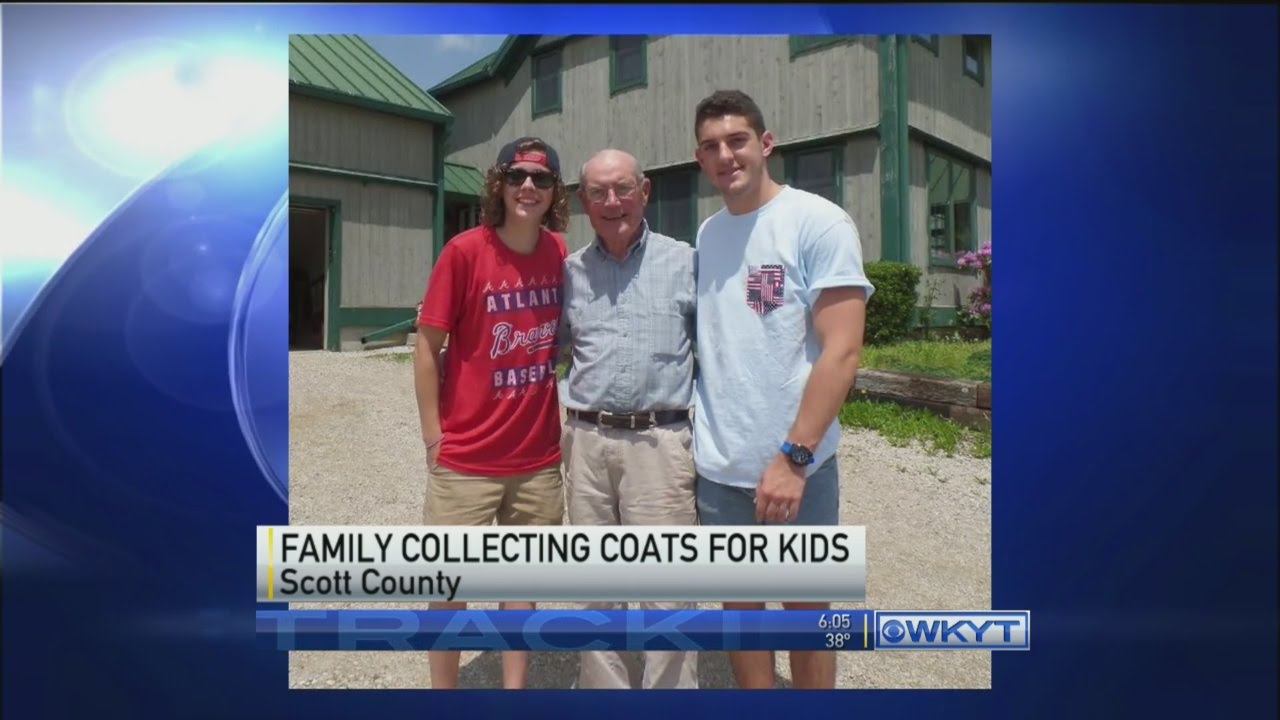 Family collecting coats for kids