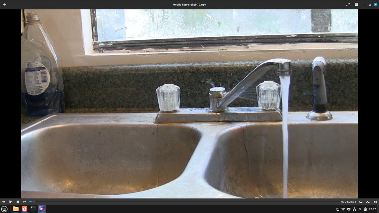 Mobile home rehab 70: replaced kitchen faucet and removed more drywall.