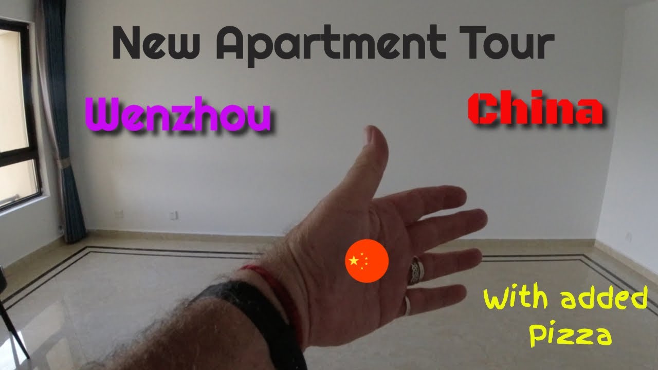 Our new apartment in Wenzhou, cleared, cleaned and ready to move in and I have pizza!