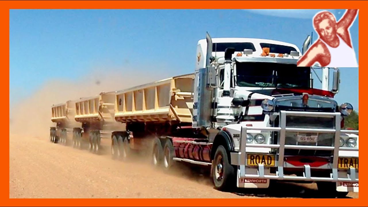 Big Road Trains Throw Dust High In The Air On The Tanami Highway Central Australia