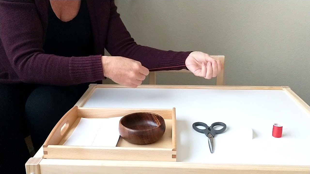 Sewing on cardboard - Montessori Curriculum with Ashley Gale