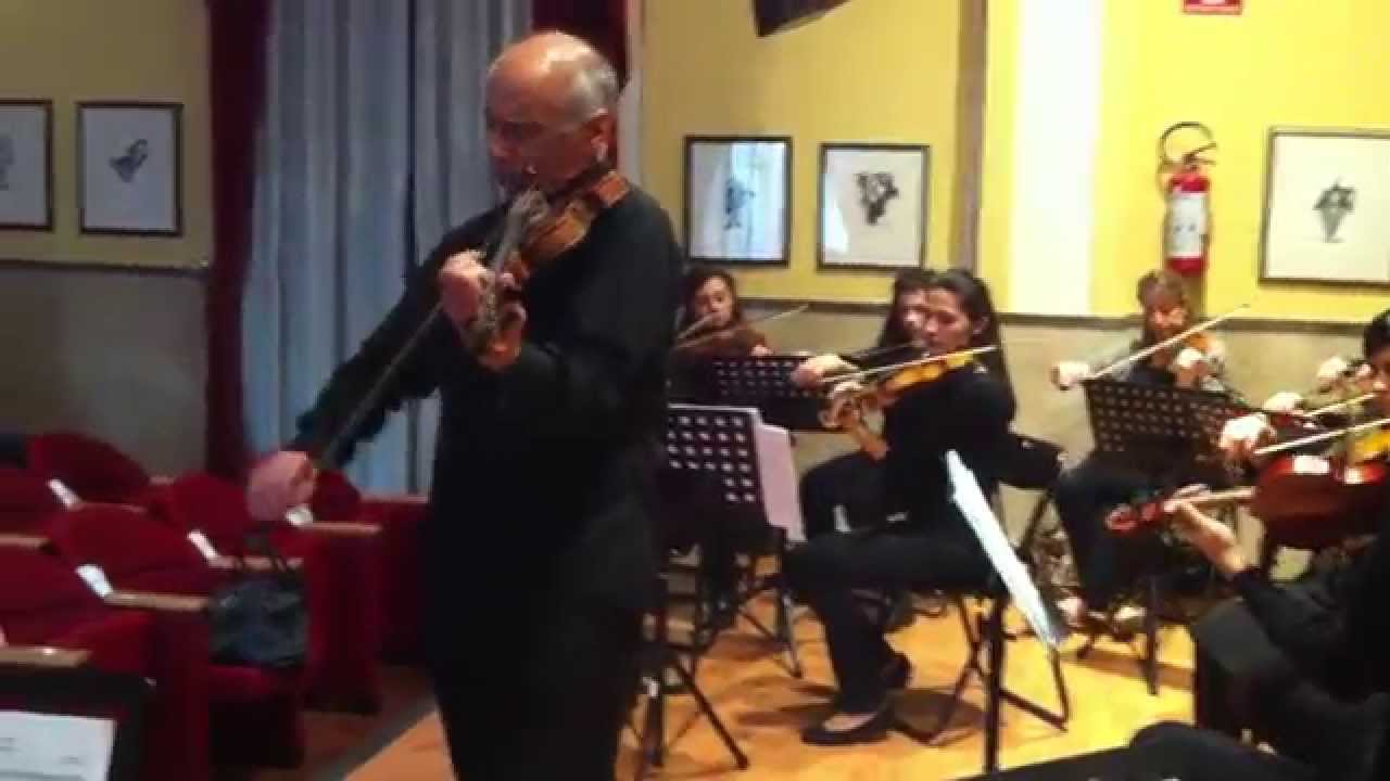 Luigi De Filippi rehearsing on themes from operas with the Cilea String Ensemble
