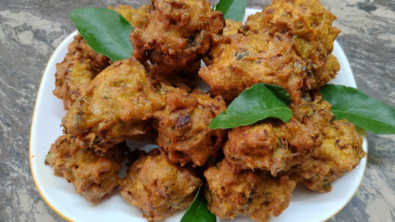 ಹೊಸ ರೀತಿ ಗರಿಗರಿಯಾದ ಈರುಳ್ಳಿ  ಮಸಾಲ ಬೊಂಡ | Onion Masala Bonda Recipe | Crispy Onion Bonda in Kannada