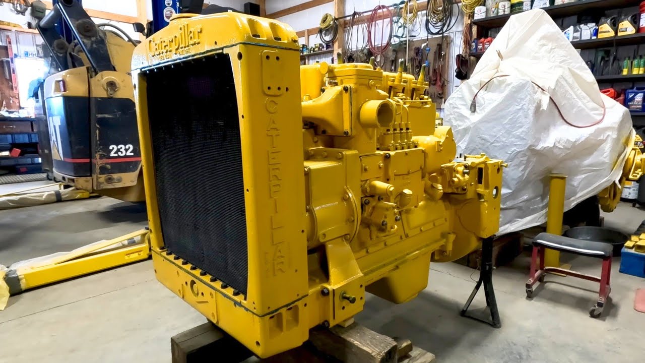 Radiator, water pump & fan belt install. Caterpillar D4 