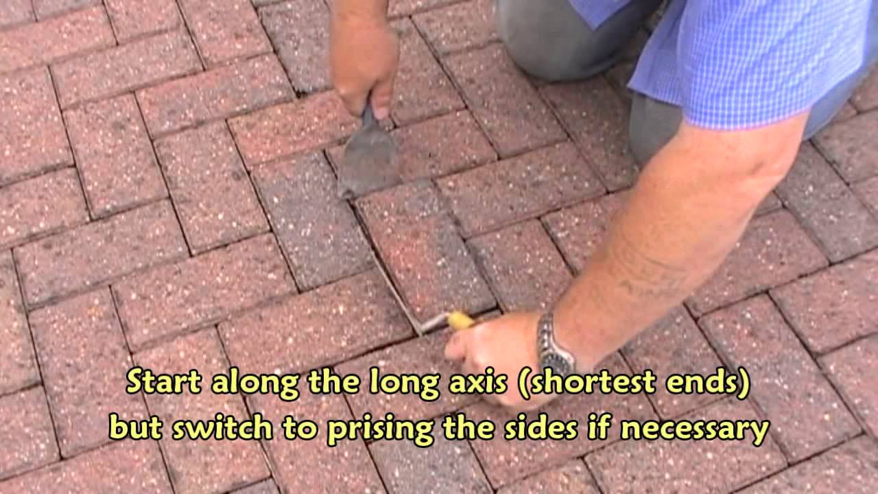 Removing a block paver using basic tools