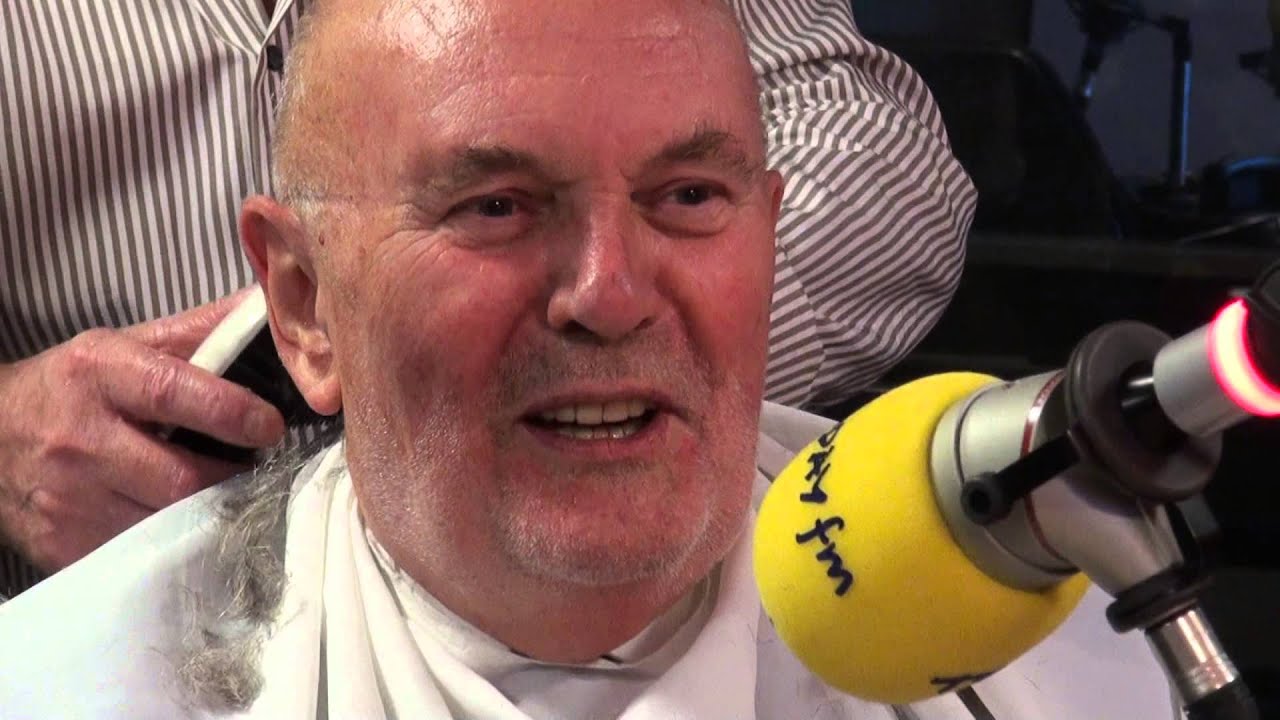 Senator David Norris shaves off his 40-year old beard.