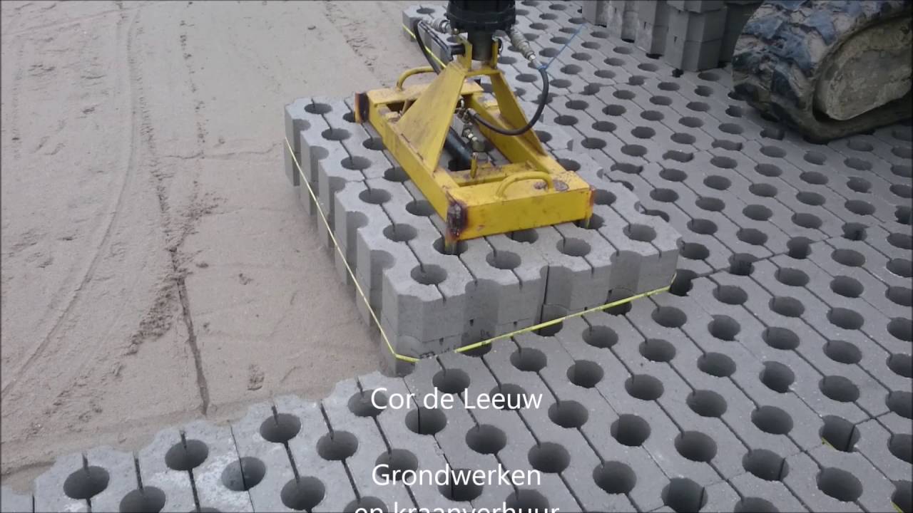 Machinaal grasbetontegels leggen
