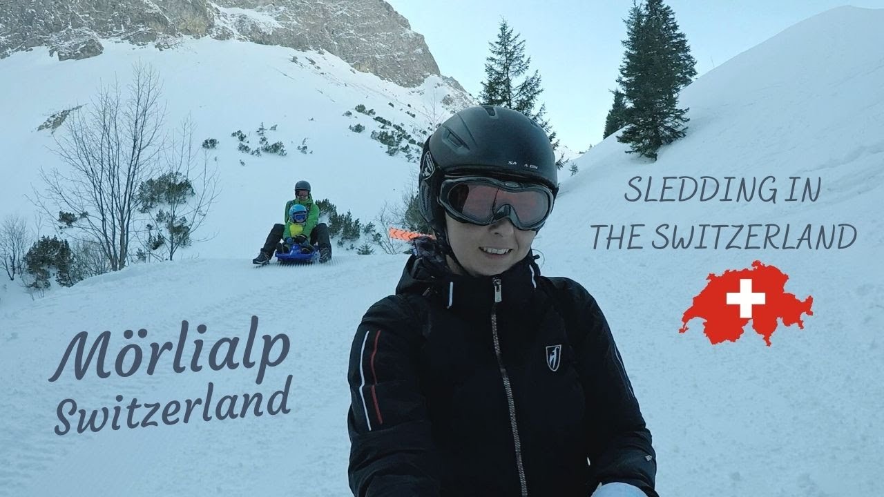 Sledding in the Swiss Alps at Mörlialp (Switzerland)