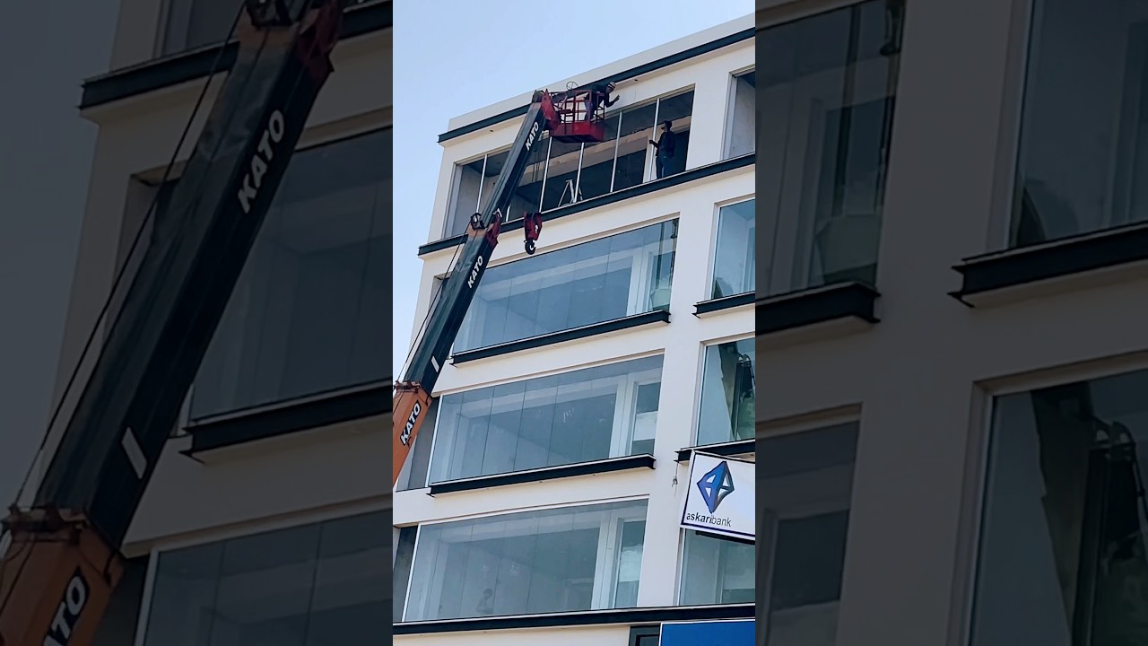 Usage of heavy equipment to fix building glass windows || #youtubeshorts  #heavyequipment #glasses