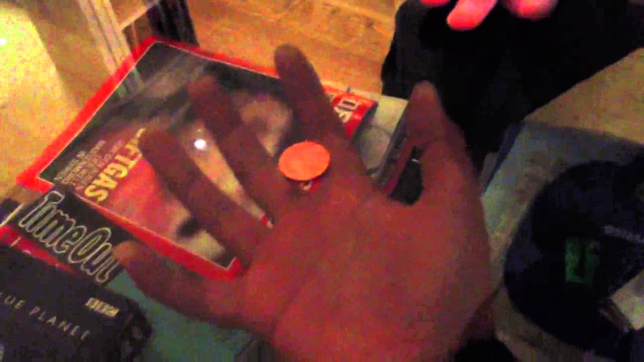 Coin through glass table