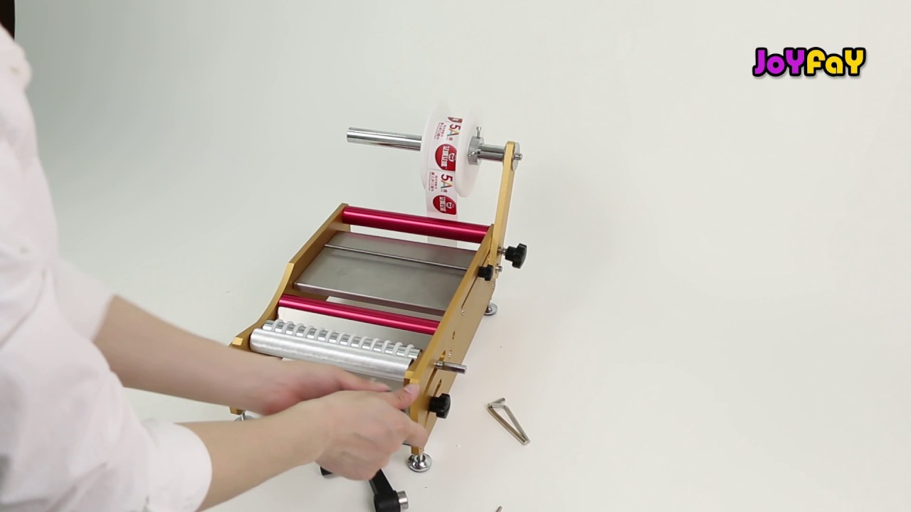 Hand-wheel manual round bottle labeling machine