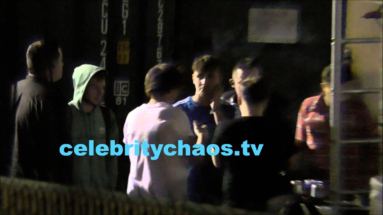 Exclusive video One Direction Liam Payne and Louis Tomlinson caught smoking