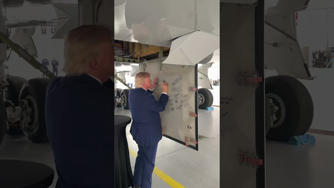 President Donald Trump - signs the mechanical panel of the new Air Force One