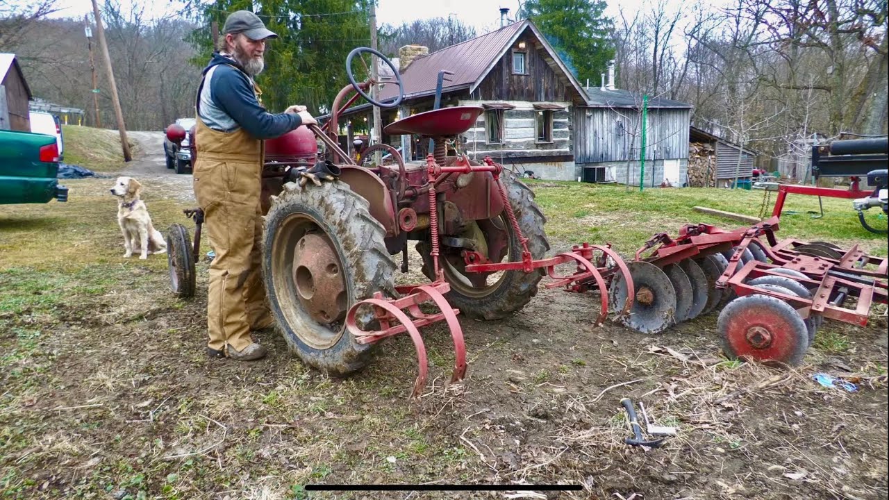 Working the garden with my 1949 Farmall cub with numerous implements. ￼