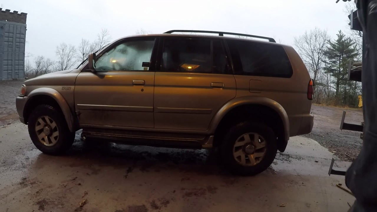 Installing air helper springs in a Mitsubishi Montero SUV