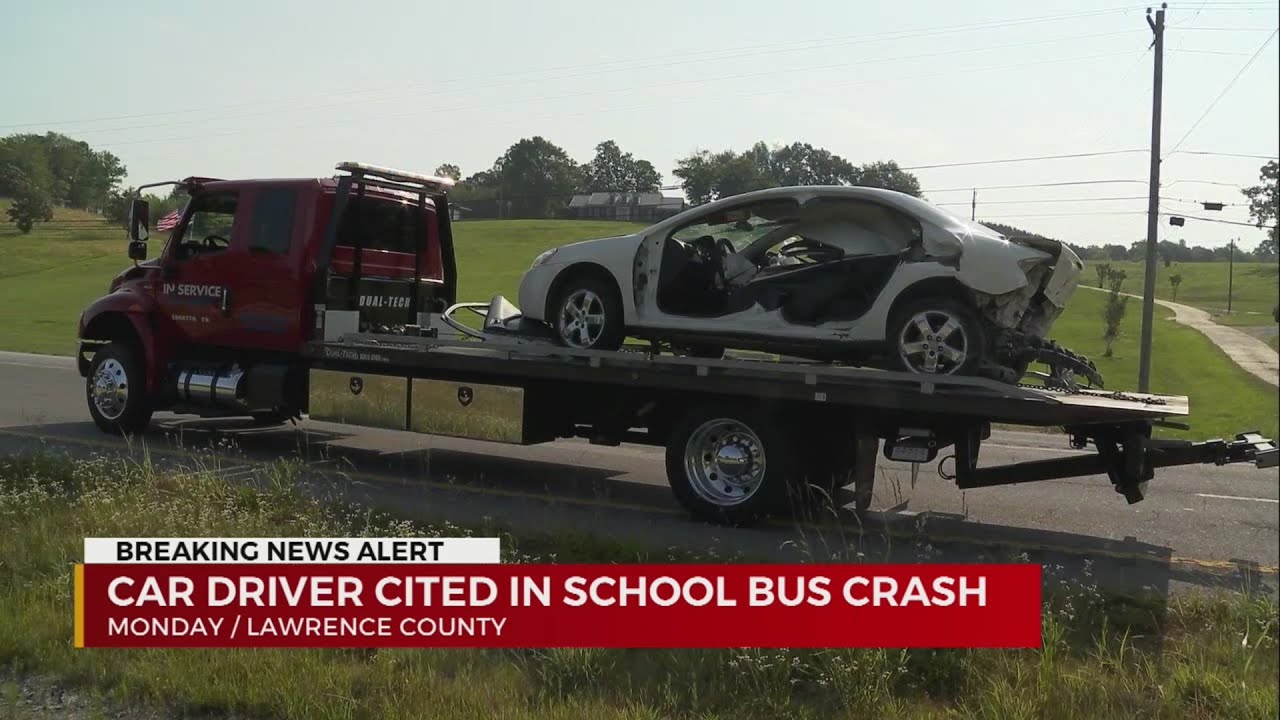 Driver cited in school bus crash