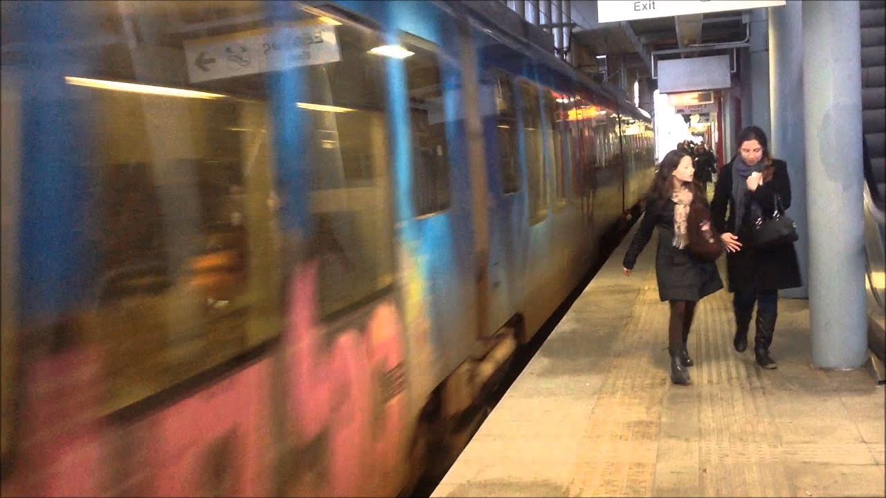 Suburban Railway (OSE): The ''Blue'' Siemens Desiro EMU departs from Neratziotissa station