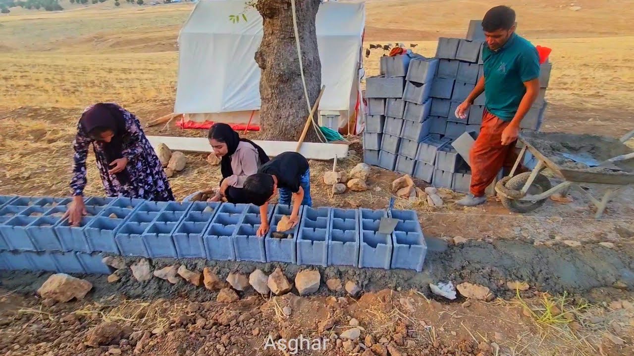 Asghar project progress: building block walls with family cooperation
