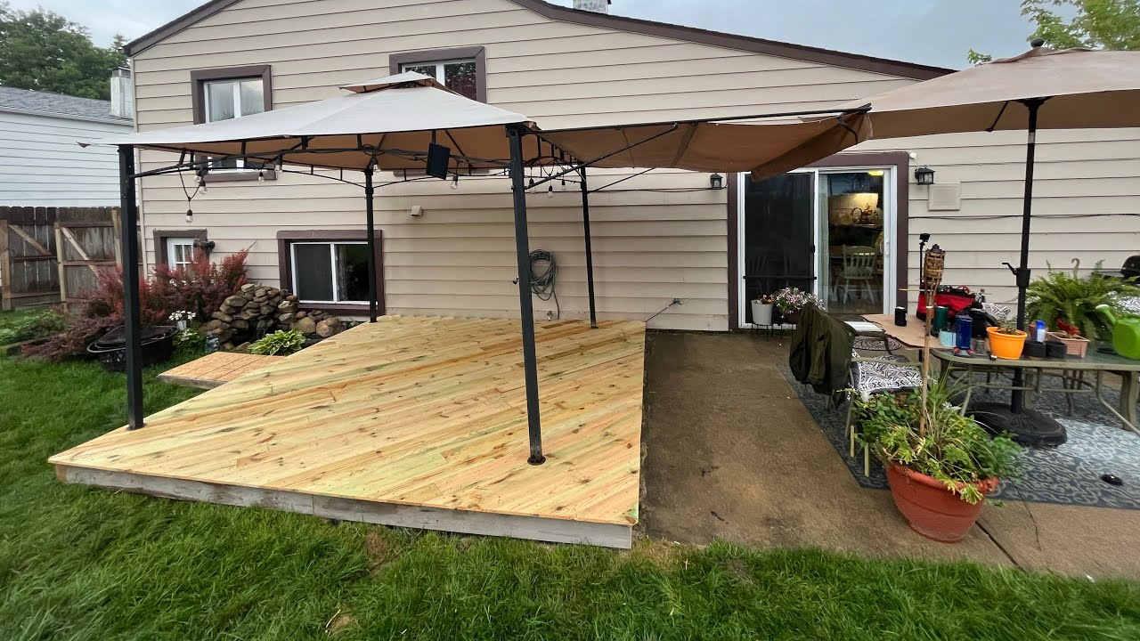 DIY PALLET DECK for under $300!!! #deck #diy #woodworking