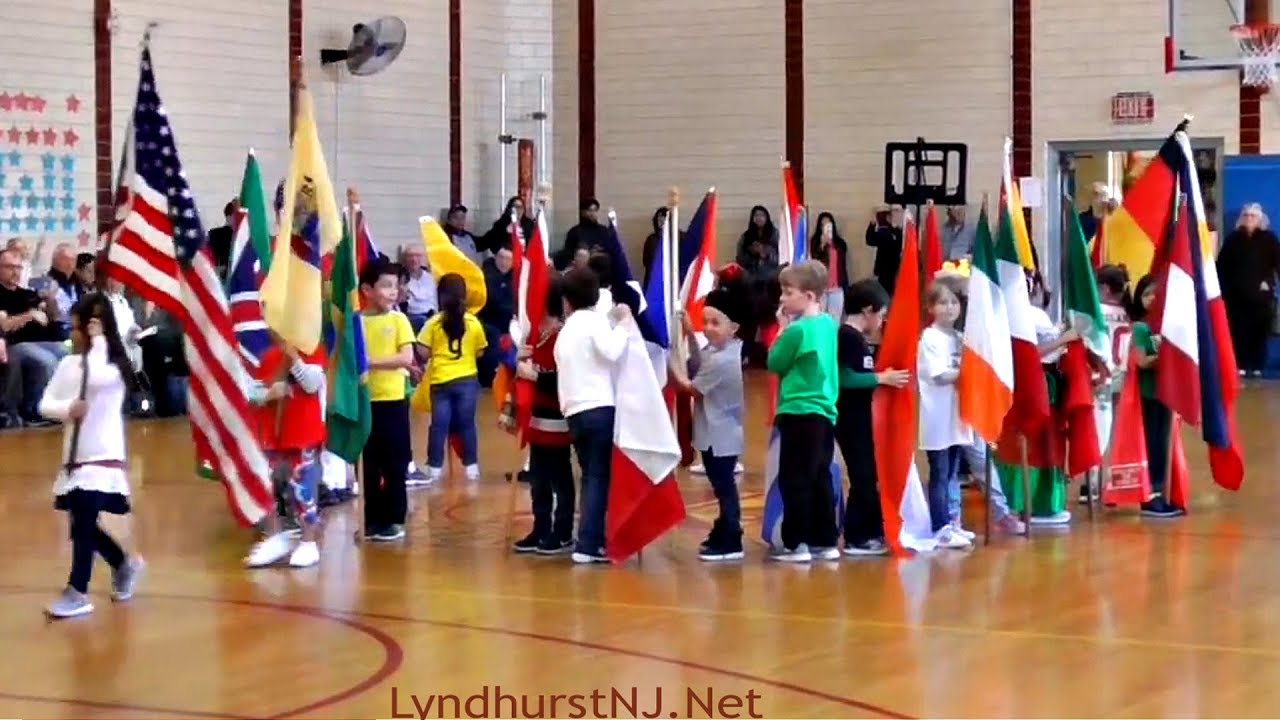Sacred Heart School Olympics Ceremony Children march with flags of dif countries India China Maya424