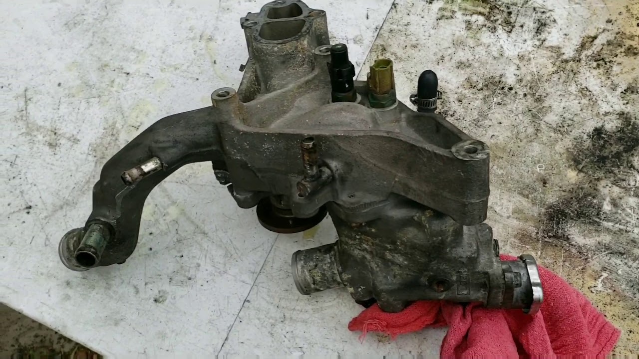 Rx7 Water pump full assembly removed, painted and replaced gaskets
