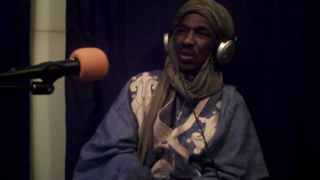 African minstrel Hassan Sango recites the family tree of his chief *with English subtitles*