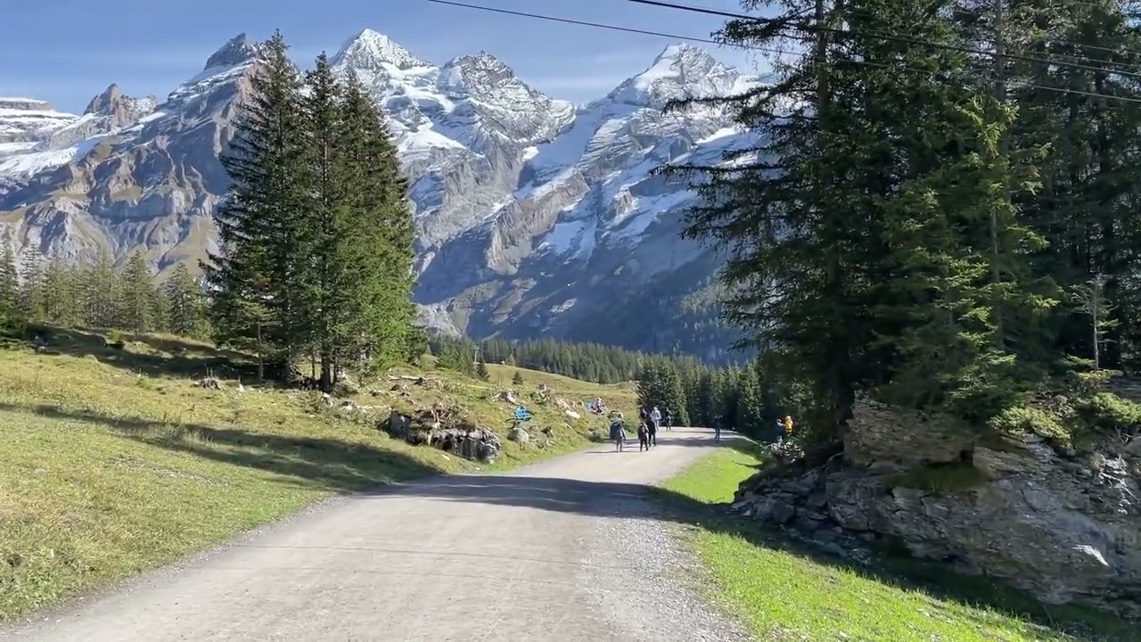 Hikers in Paradise: Exploring the Majestic Mountain Scenery 🌄 #HikingAdventure #MountainMagic