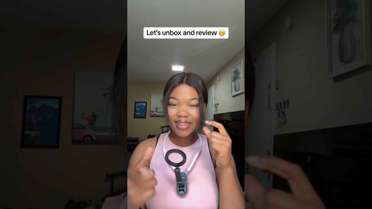 Magnetic neck phone holder