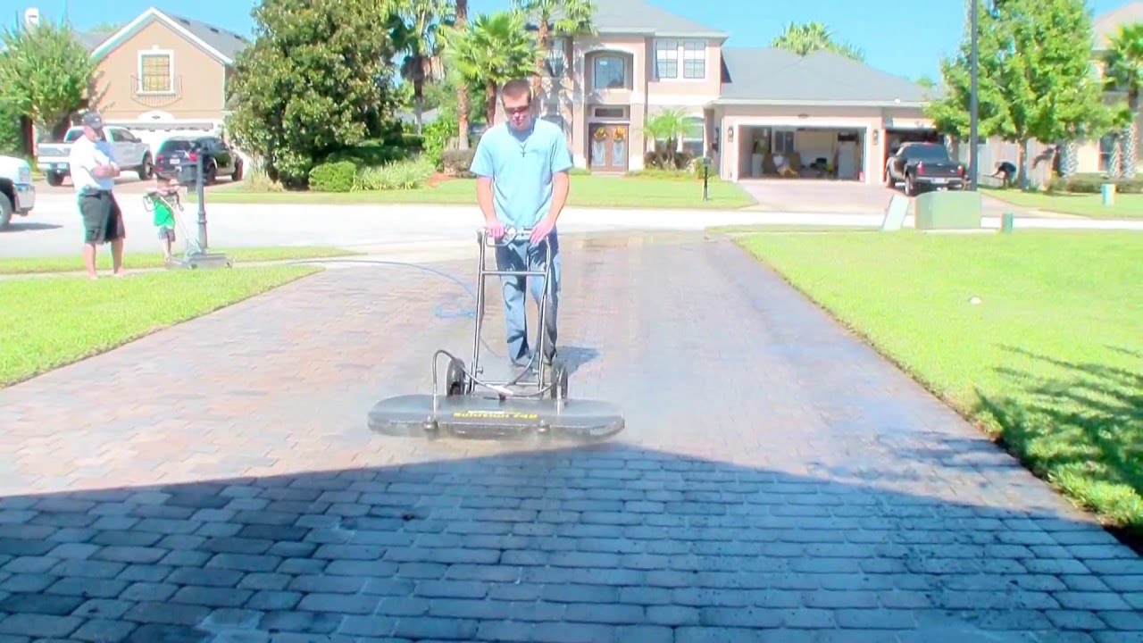 Pressure washing a 1500 Sq. Ft. paver driveway in 7 minutes. By Dan Swede