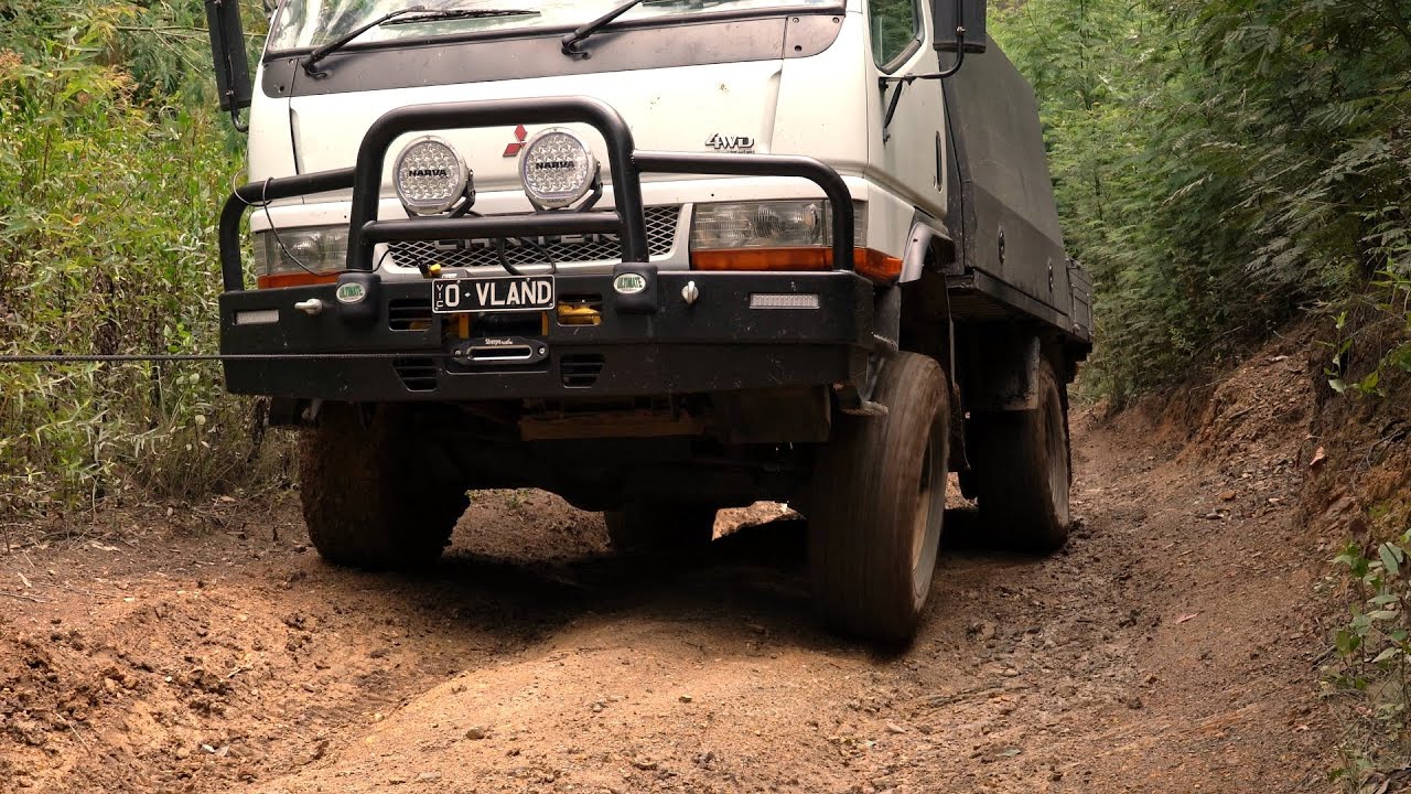 4x4 Canter Truck needs a winch along the flooded Snowy River.