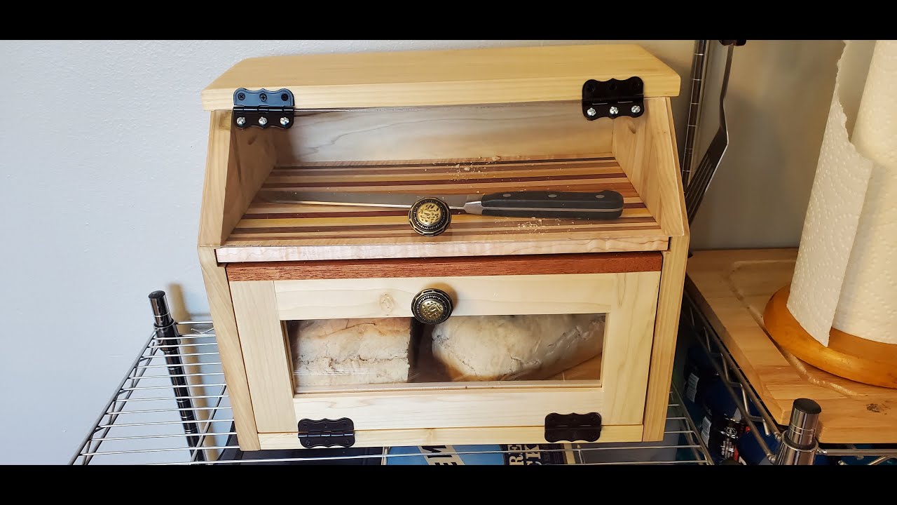 I made a breadbox with a built in cutting board.