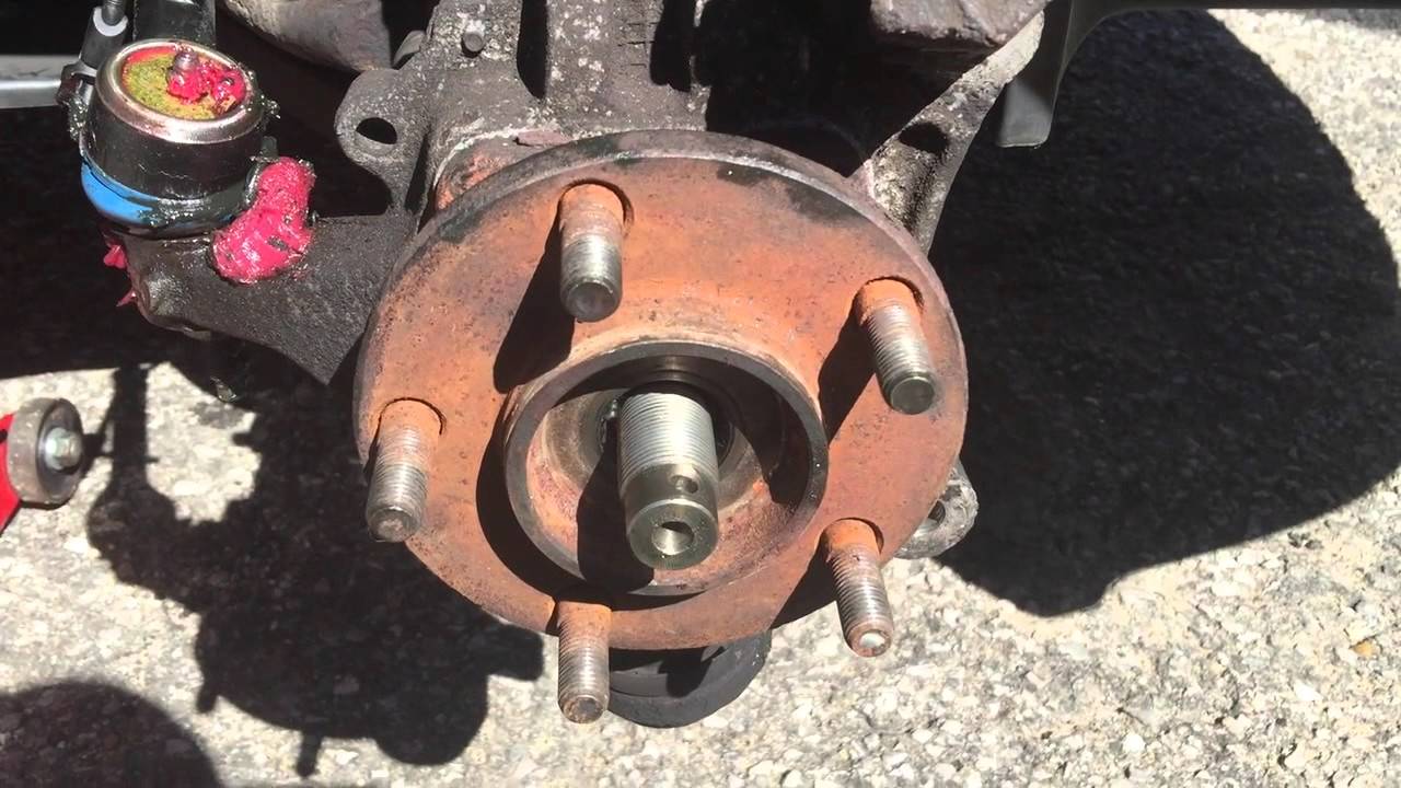 Replacing the front wheel hub assembly on a 4th Gen Chrysler or Dodge minivan.